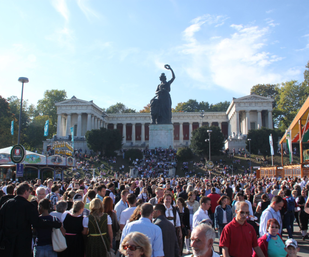 a group of people standing in front of a crowd